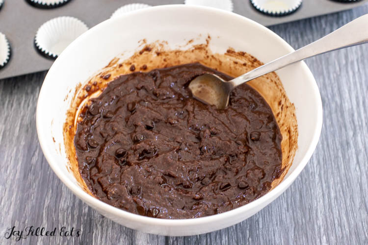 brownie batter in bowl with spoon