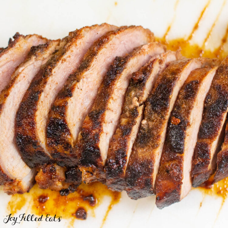 close up on slices of smoked paprika pork tenderloin