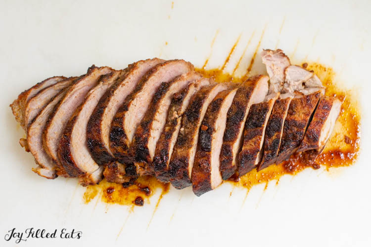 smoked paprika pork sliced on cutting board