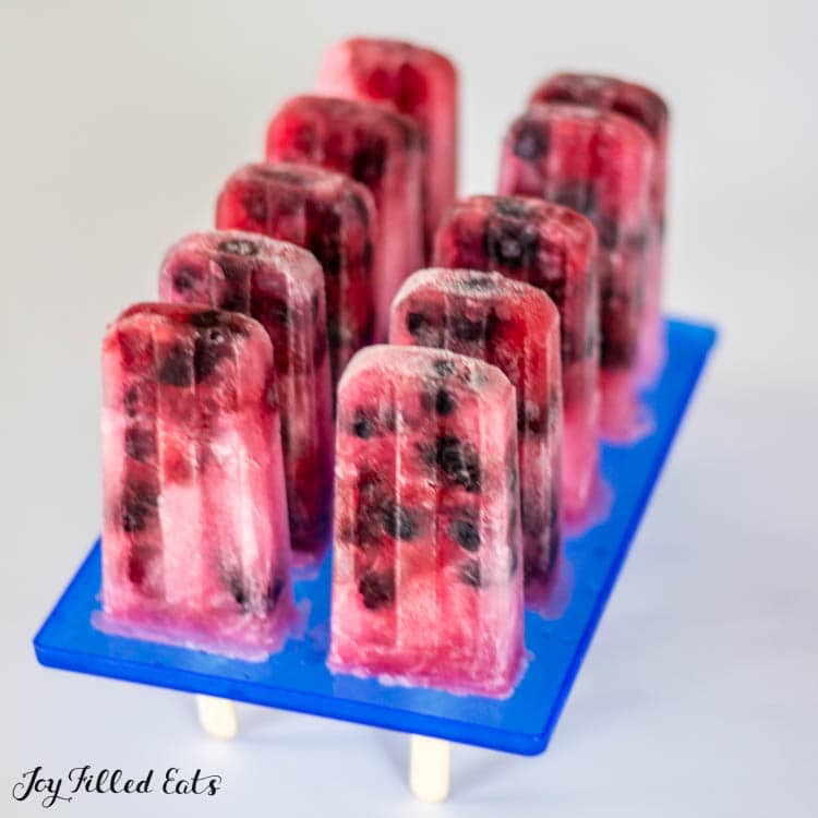 sugar-free popsicles with berries in tray