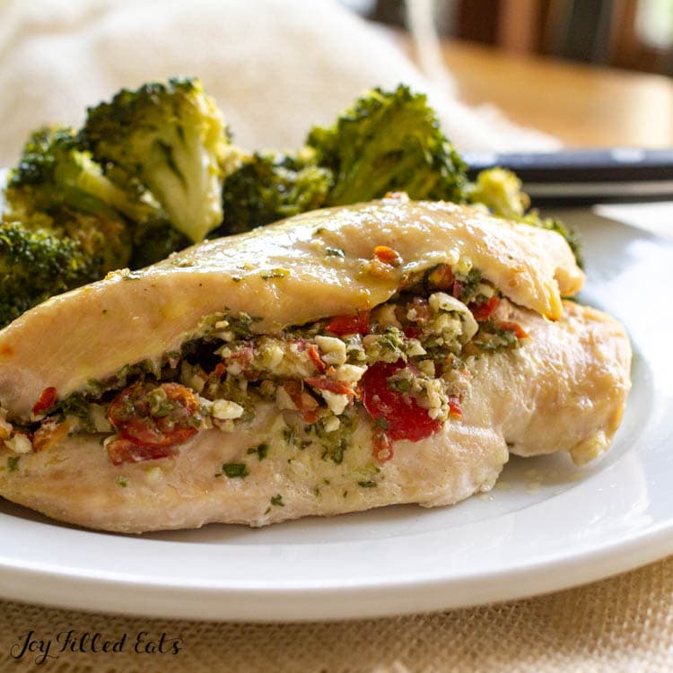 dinner plate with greek chicken and broccoli