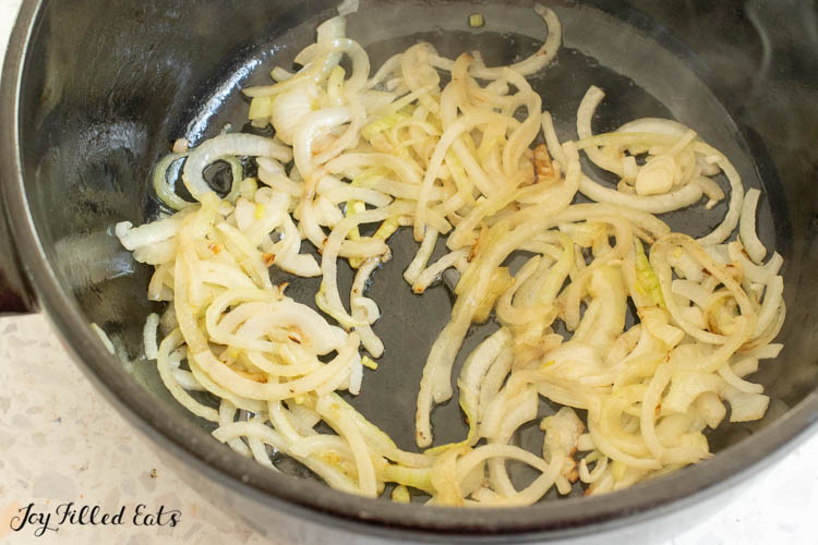 sauteed onions in stock pot