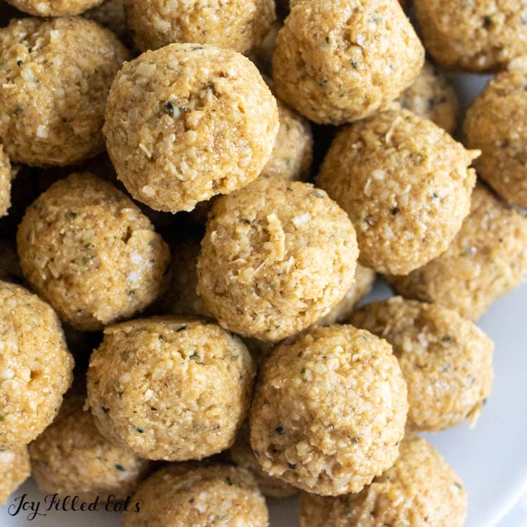 close up of peanut butter bliss balls on plate