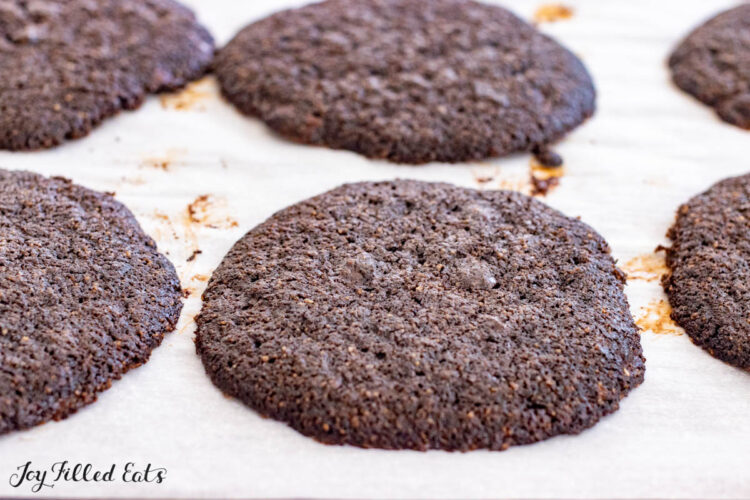 baked chocolate almond flour cookies on tray