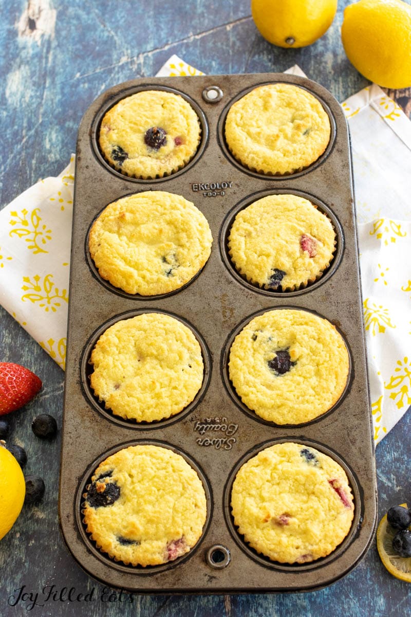 keto lemon muffins with berries in pan
