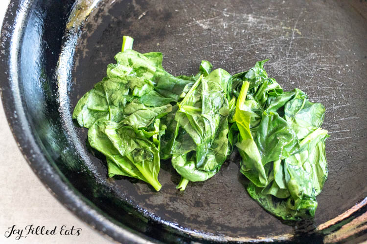 sauteed spinach in pan