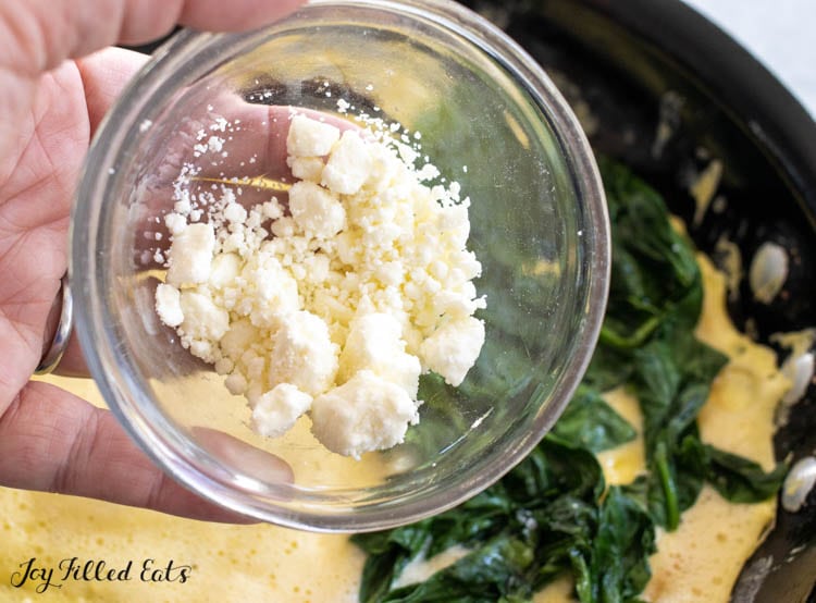 feta cheese being added