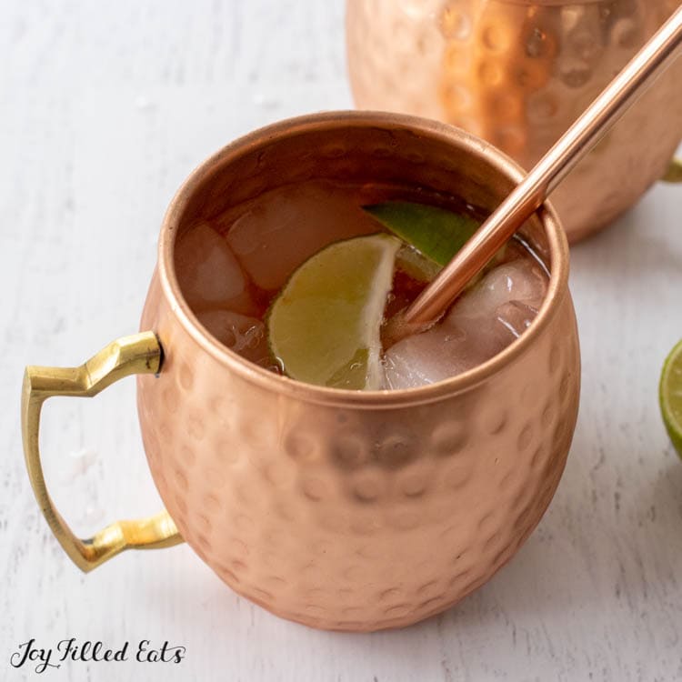 keto moscow mule in copper mug with straw