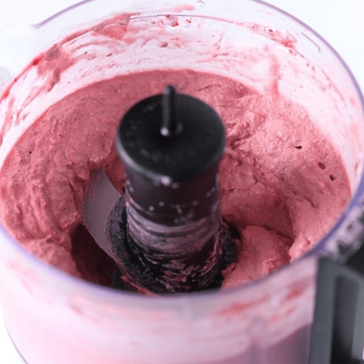 creamy pink mixture in food processor