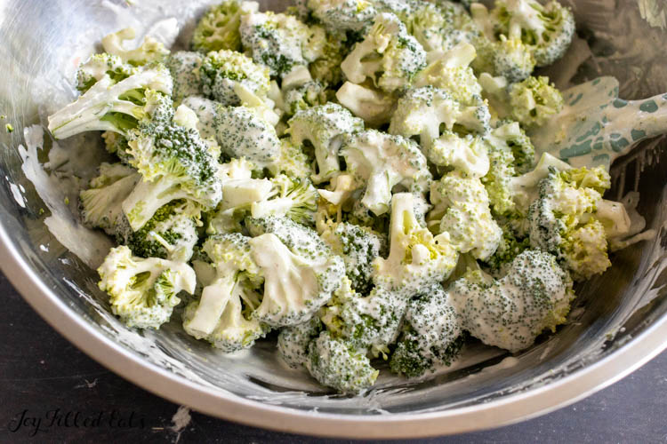 broccoli in dressing in bowl