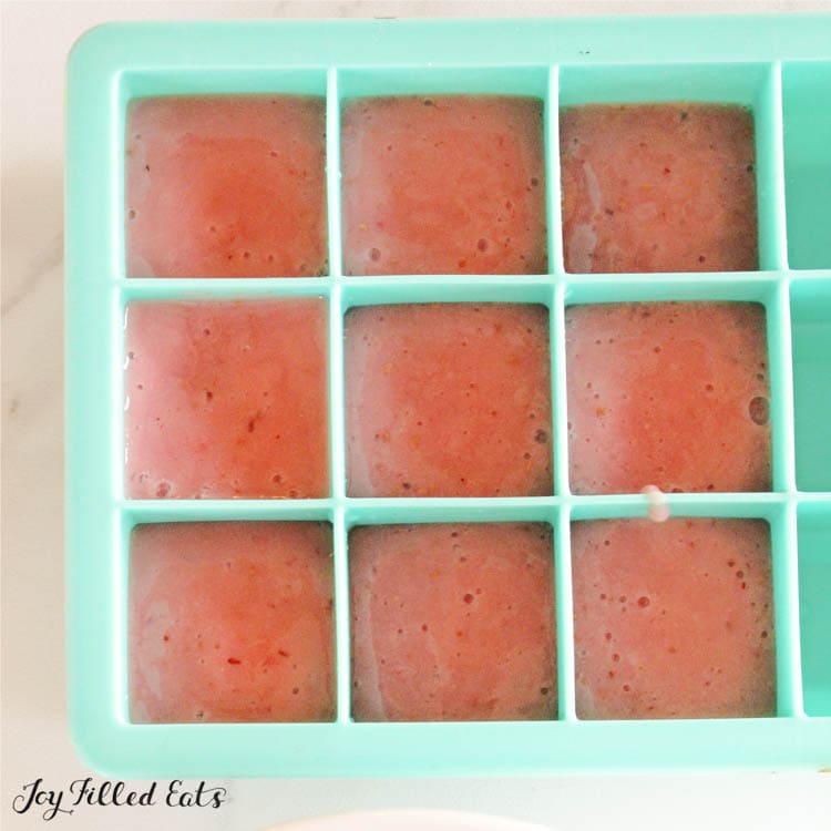 square ice cube tray with berry puree
