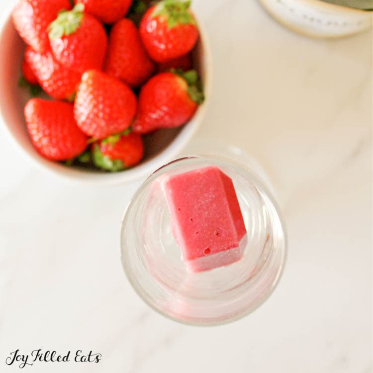 frozen berry puree cube in glass
