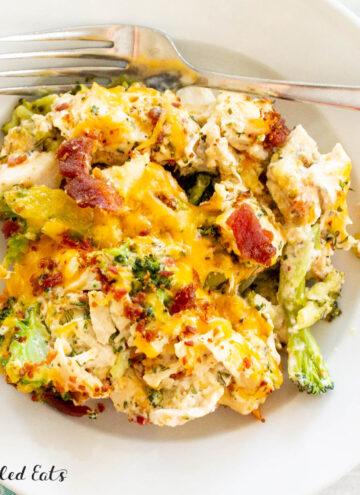 Overhead of Keto Chicken Bacon Ranch Casserole in shallow white bowl with fork