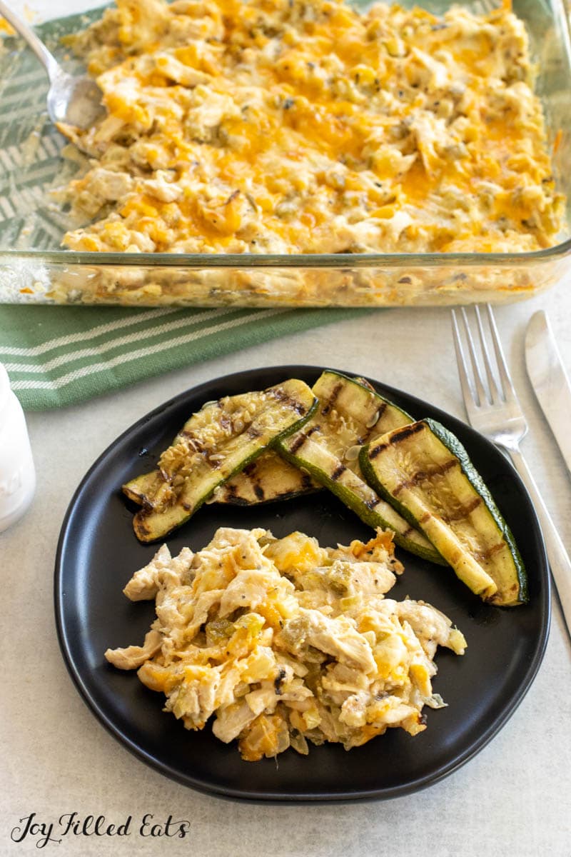 keto green chili chicken casserole in baking dish and on small plate