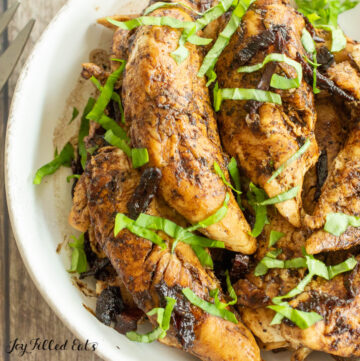 Dish filled with basil balsamic chicken