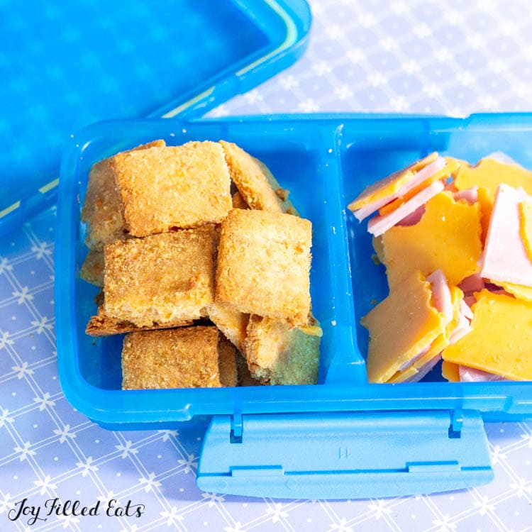 snack container with cheese crackers and ham and cheese