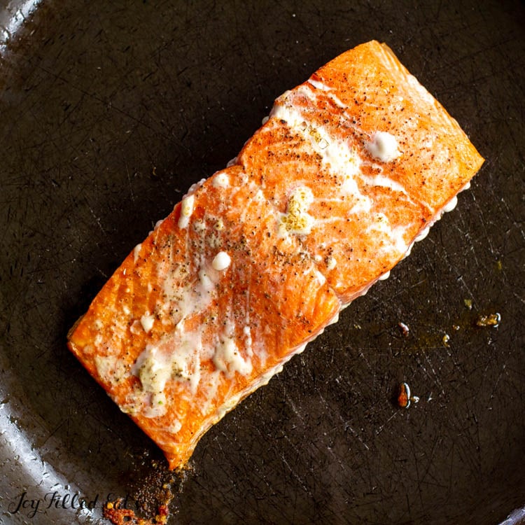 salmon filet in frying pan