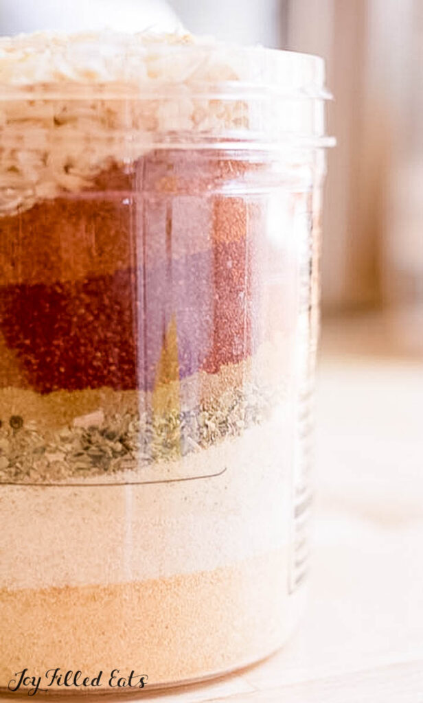 spices layered in plastic jar