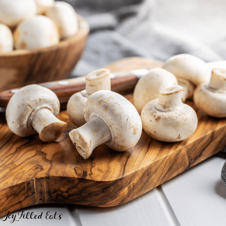 mushrooms on cutting board