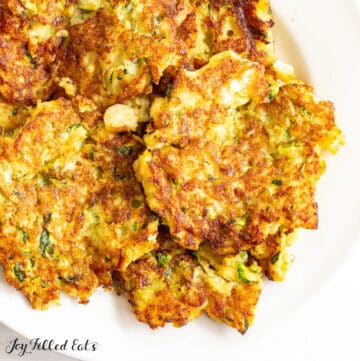 keto zucchini fritters served on a white plate