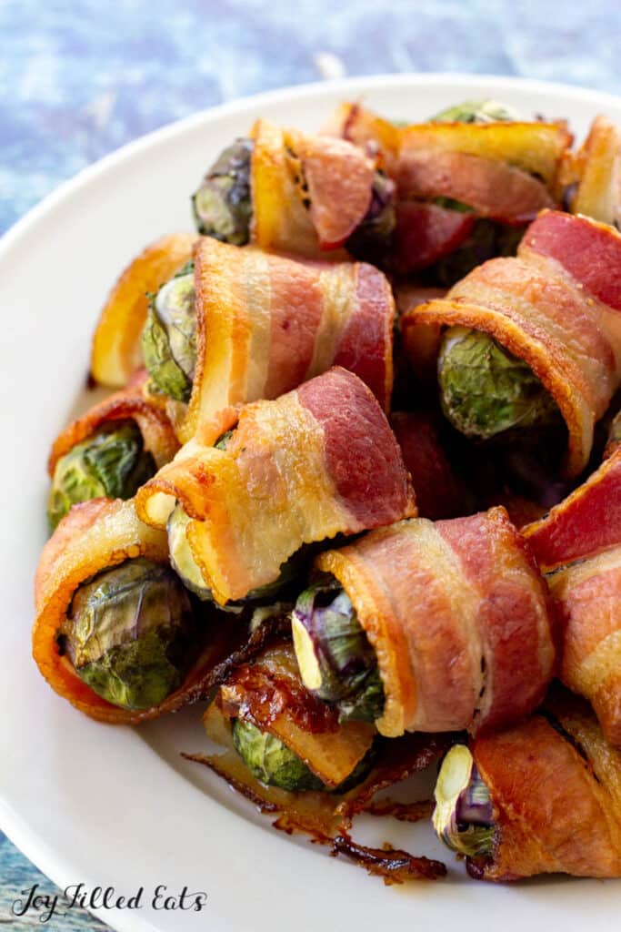 plate of bacon wrapped brussels sprouts