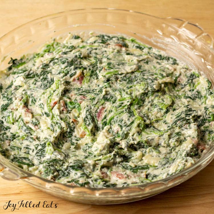pie plate with spinach mixture
