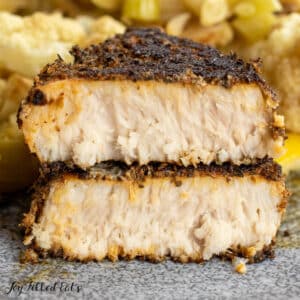blackened swordfish recipe shown in halved pieces stacked on top of each other