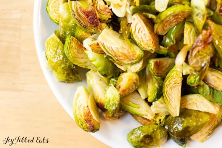 close up of roasted brussels sprouts with garlic
