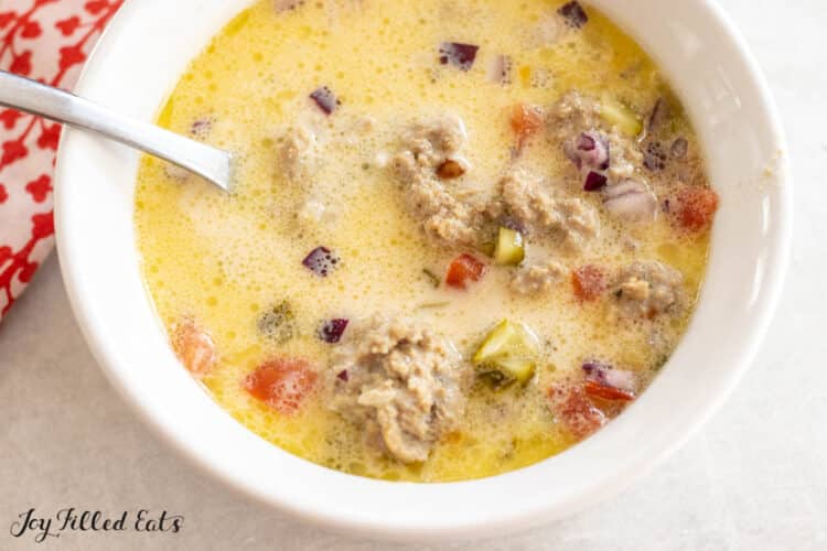 keto cheeseburger soup recipe in a bowl with a spoon