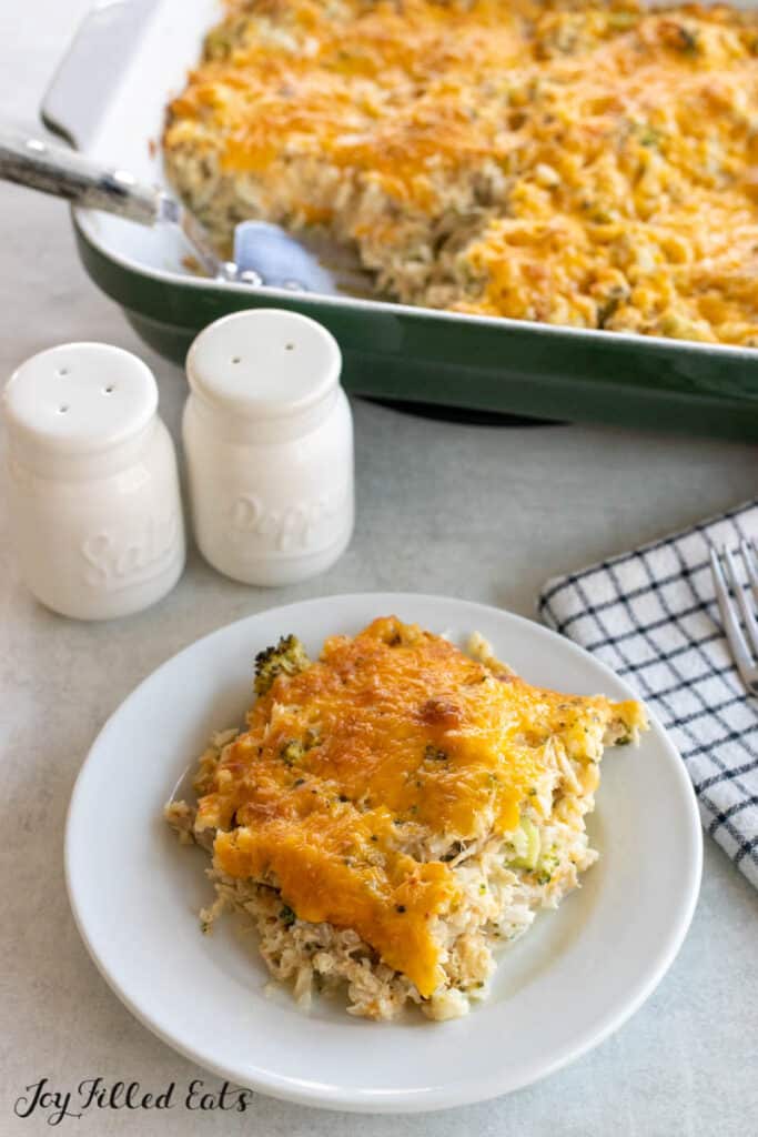 plate with keto chicken and rice casserole recipe and baking dish behind