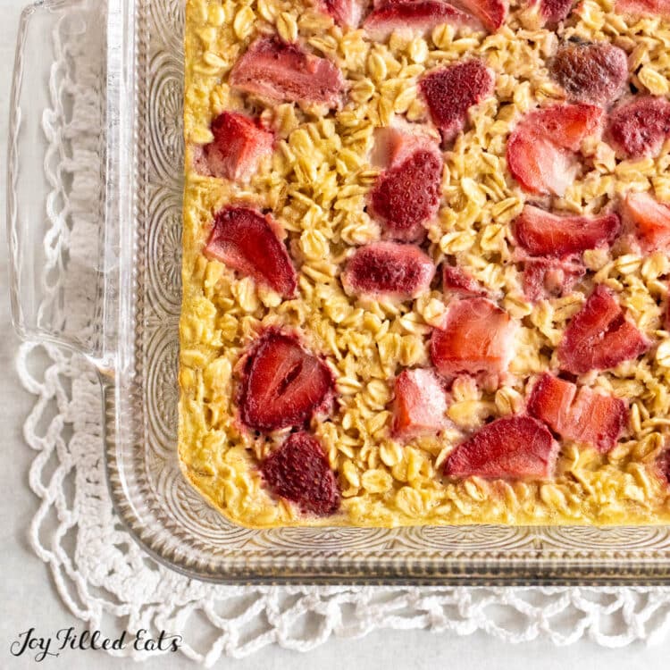 healthy baked oatmeal with strawberries in baking dish