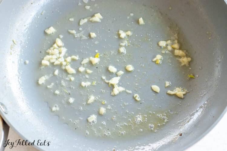 frying pan with garlic