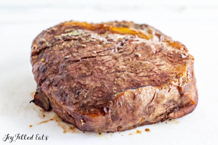 steak resting on cutting board