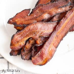 broiled bacon recipe served on a plate close up