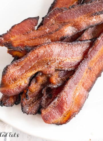 broiled bacon recipe served on a plate close up