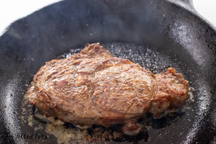 close up of sizzling steak
