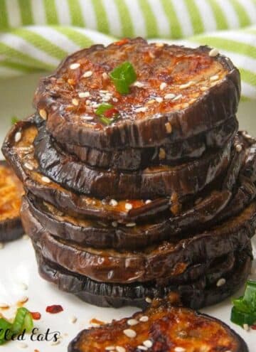 oven roasted eggplant with sweet and spicy glaze in a stack