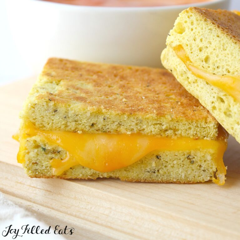 keto grilled cheese recipe cut in half and served on a plate