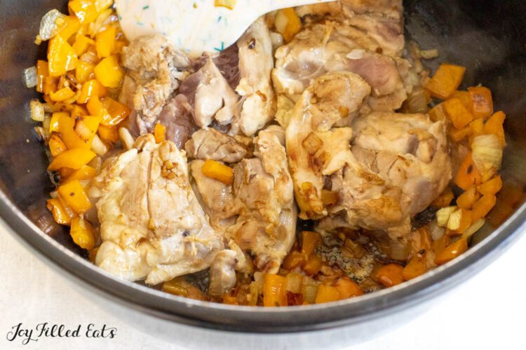 seared chicken in pot