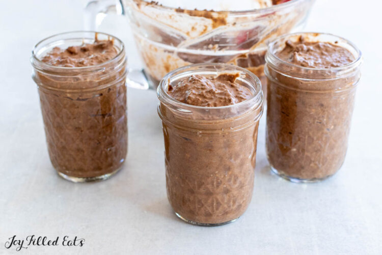 chocolate mixture added to small mason jars
