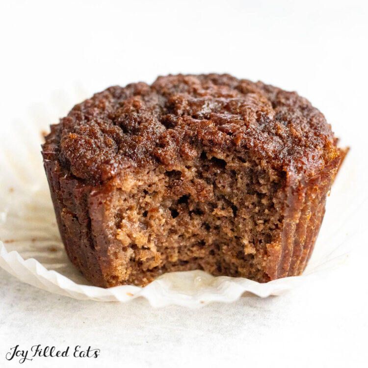 chocolate protein muffin missing a bite