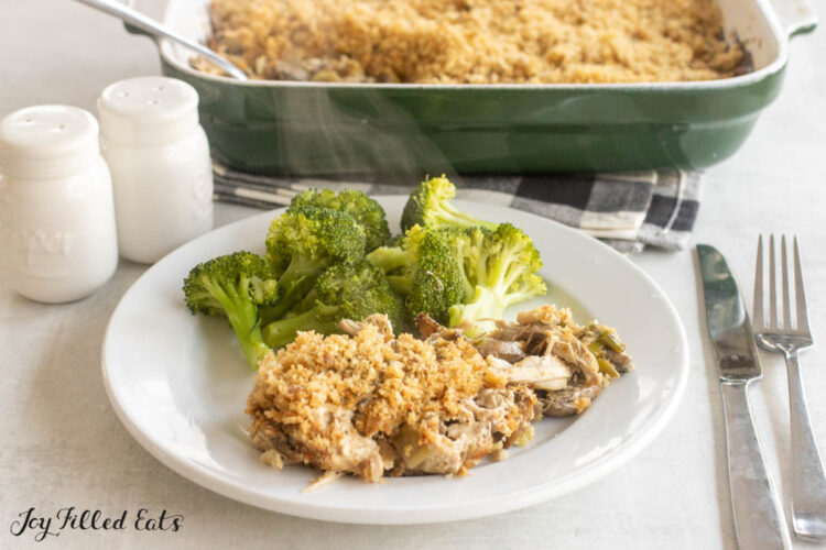 chicken leek mushroom casserole served on plate with broccoli