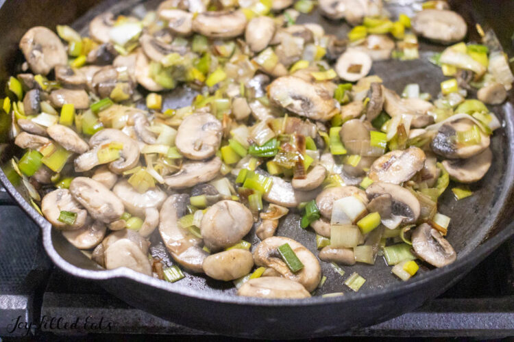 mushrooms and leeks in frying pan