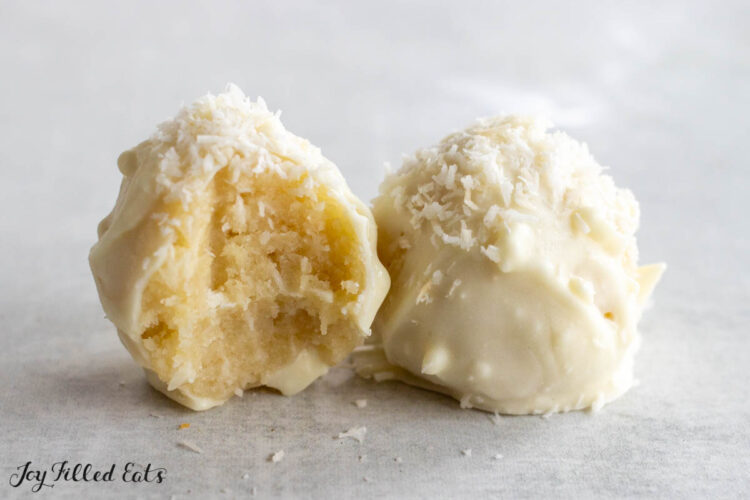 two truffles next to each other with one missing a bite