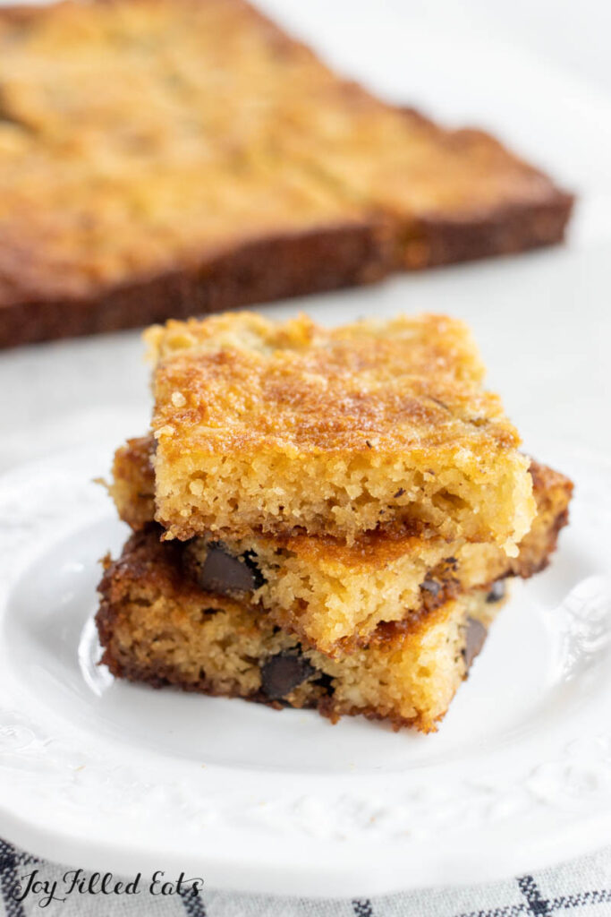 stack of almond flour cookie bars on a plate