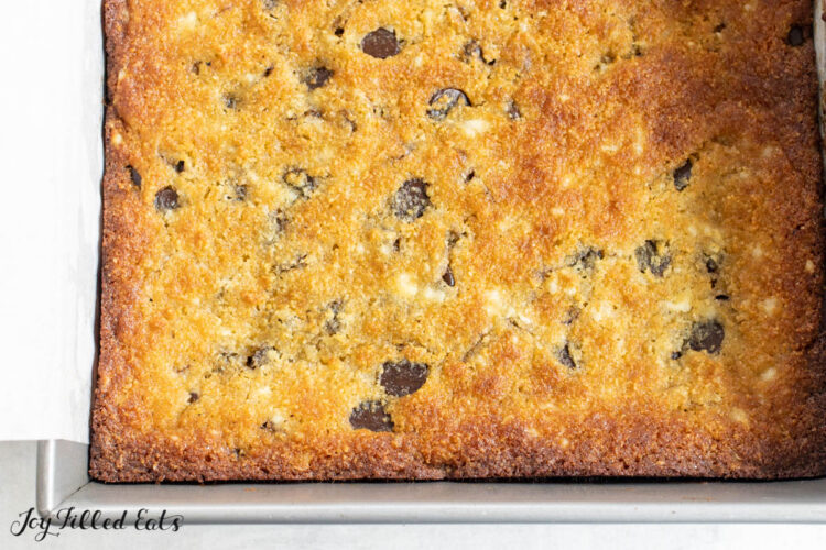 baked cookie bars in parchment lined pan