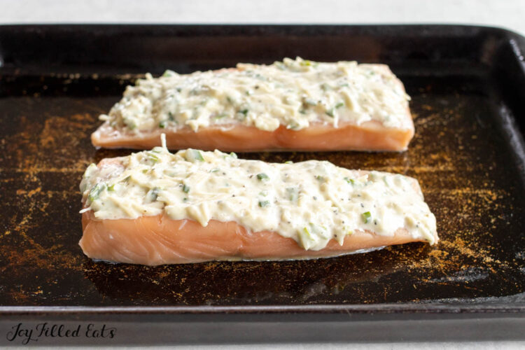 sauce spread on top of the fish