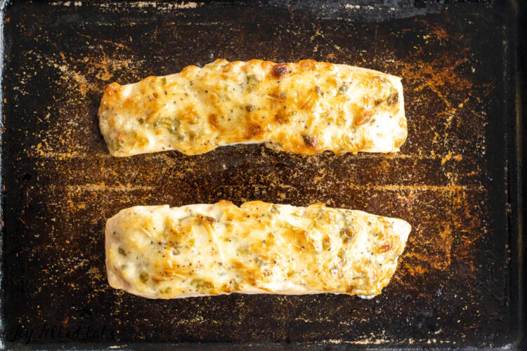 baked salmon with mayo on a baking dish