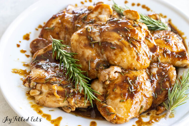 balsamic rosemary chicken thighs on serving platter