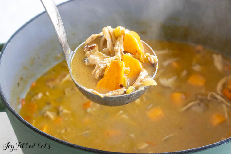 ladle lifting up some soup